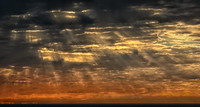 Glimses of light through the clouds - Sunrise Botany Bay