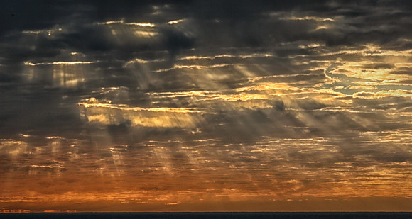 Glimses of light through the clouds - Sunrise Botany Bay
